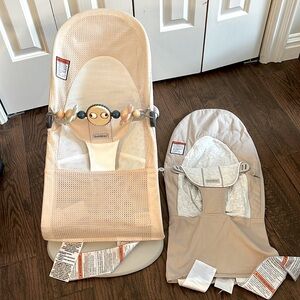 Baby Bjorn bouncer with extra cover and toy bar.